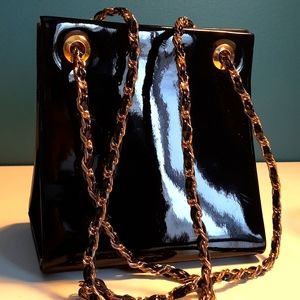Vintage patent leather purse. Black, gold accents. Black and gold chain.